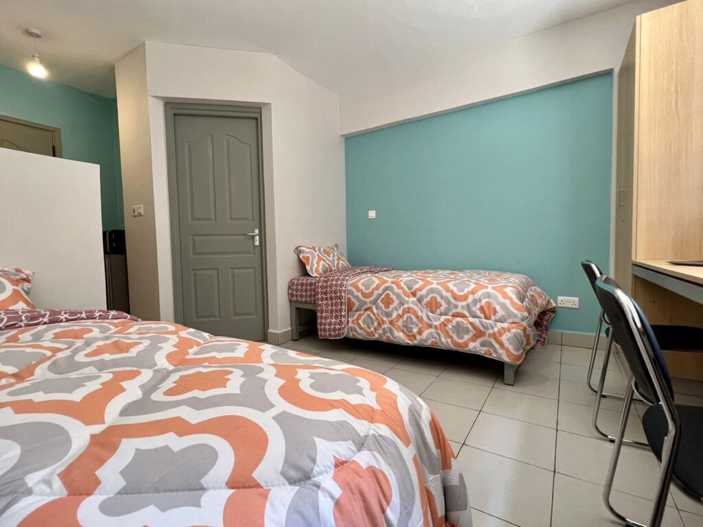 Why do hostels ask for a security deposit?